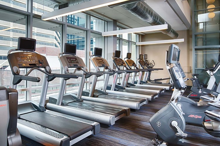 Get your heart rate up in our cardio room with gorgeous views of the city