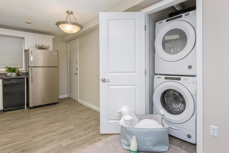 Full size, stackable washer and dryer appliances included in select apartment homes.