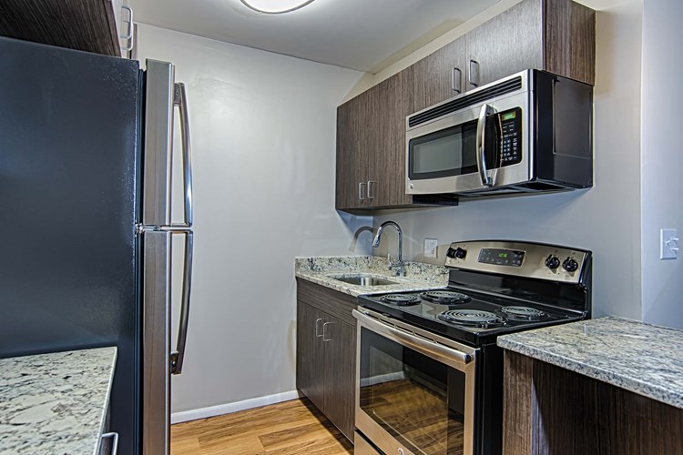 Renovated kitchens are available in select homes, featuring granite countertops and stainless steel appliances