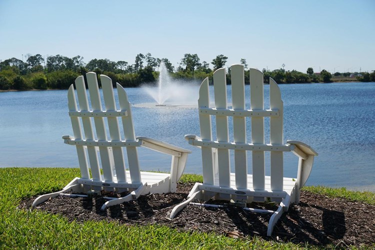 Enjoy the beautiful lake views from our Adirondack chairs around the community.