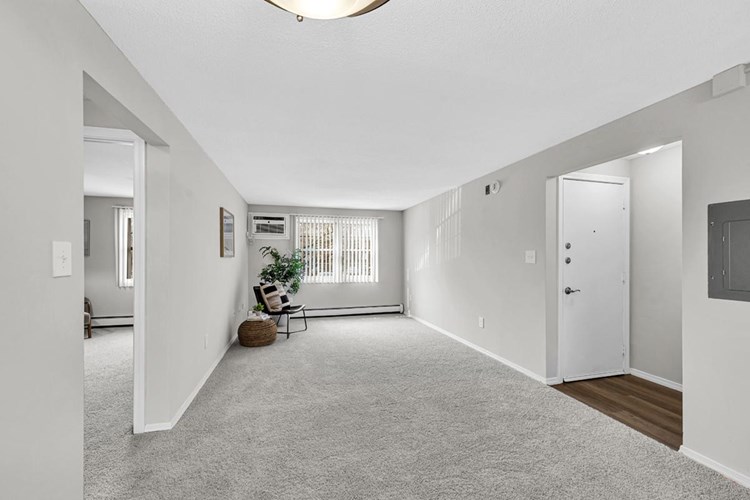 Enjoy your bright, spacious living room featuring plush carpeting.