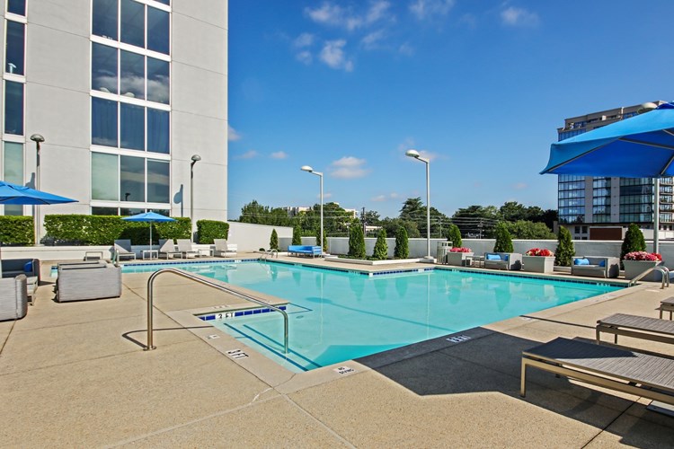 Lounge by the pool and enjoy skyline views