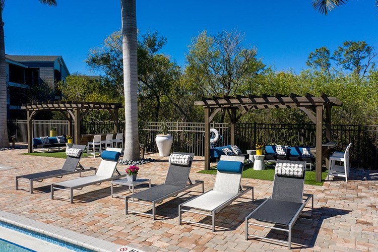 Read a book by the pool on our sundeck, complete with plenty of poolside loungers.