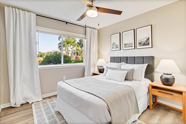 Guest bedrooms boast natural light, closets and multi-speed ceiling fans.