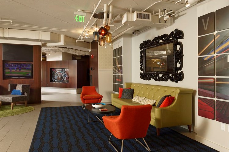 Lobby with lounge seating and flat screen television