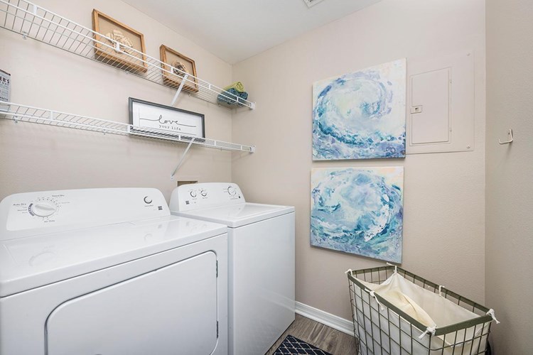 Your spacious kitchen is attached to your very own laundry room complete with full size washer and dryer appliances for your convenience. 