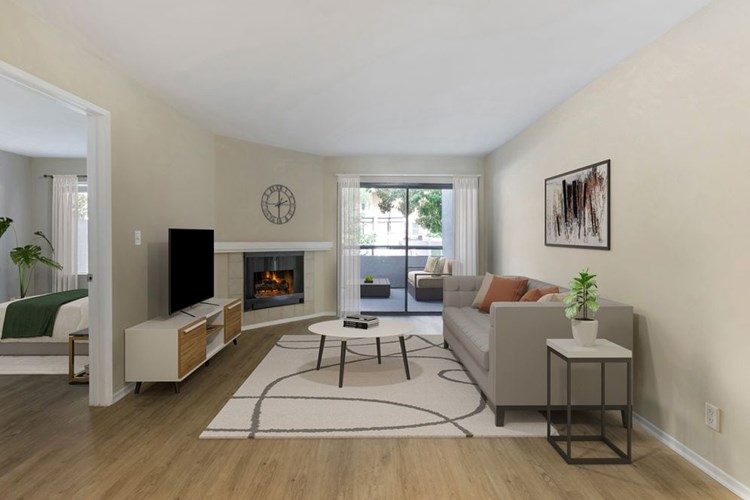 Renovated Package I living room with hard surface flooring