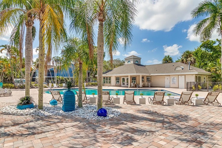 Both pools feature an expansive sundeck surrounded by beautiful landscaping.