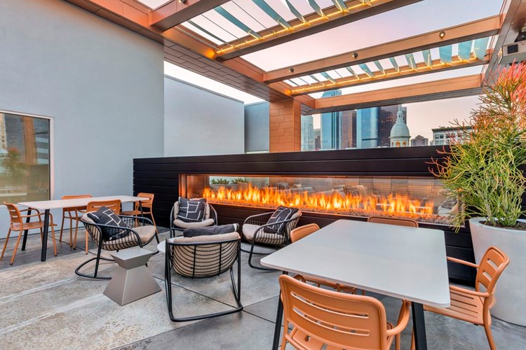 Rooftop with fireplace and lounge seating