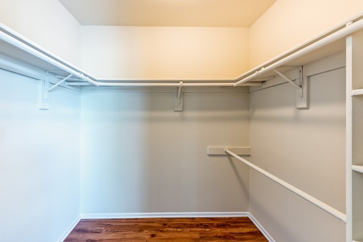 A walk-in closet provides extra storage space
