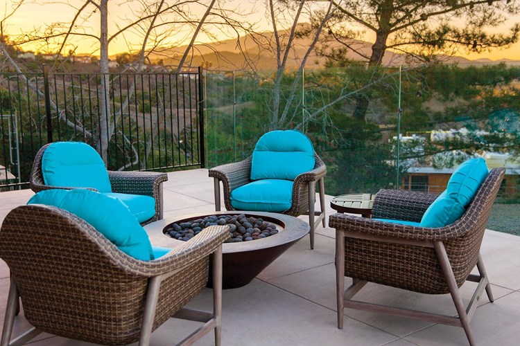Get cozy and warm up on breezy nights at the fire pit located on the pool deck