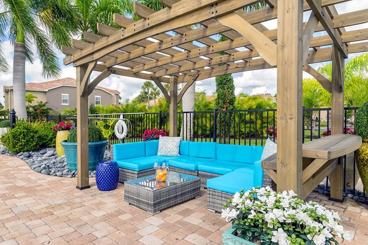 Relax under our poolside pergola on our expansive sundeck.