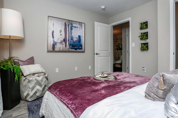 Spacious bedrooms featuring large closets with built-in organizers for your convenience. 