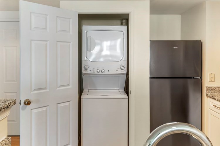 Renovated Package I kitchen with in-unit laundry
