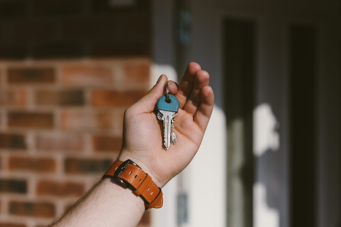 Hand Holding Keys