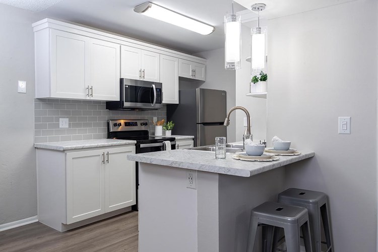 All of our kitchens feature stainless steel appliances.