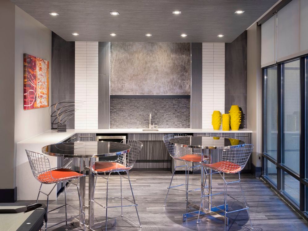 Resident lounge with kitchenette and dining area