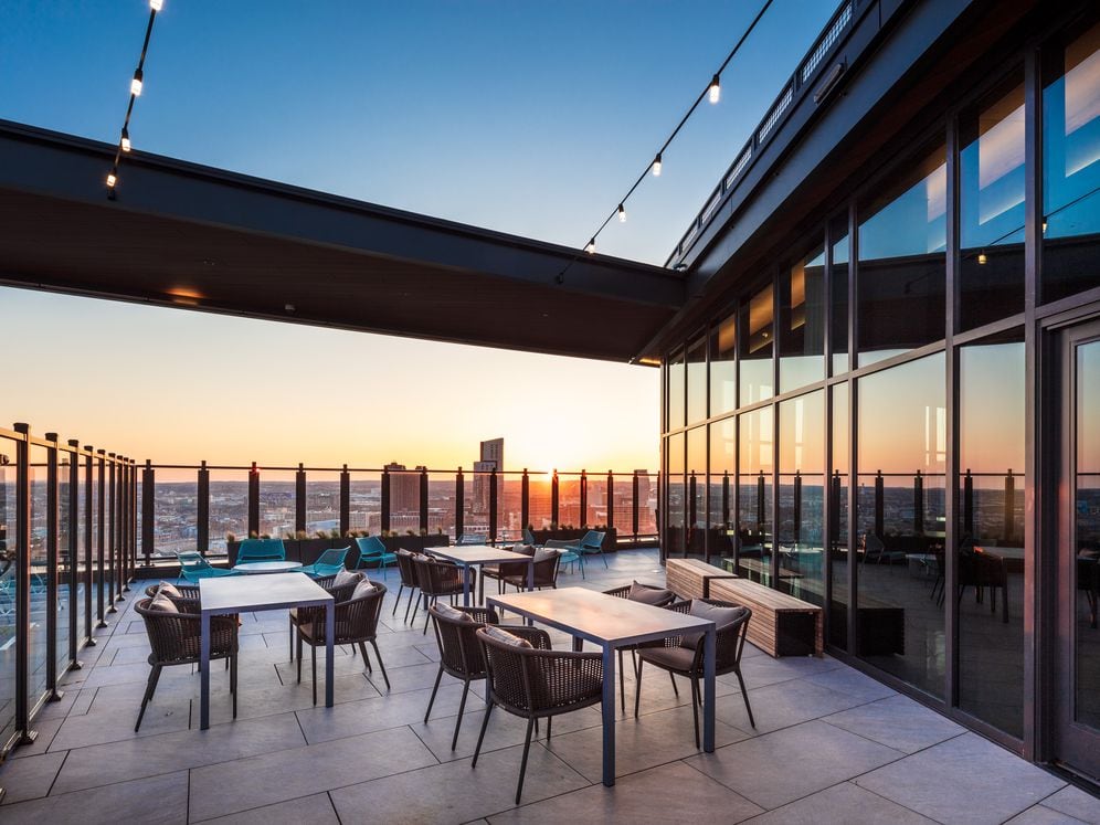 24th Floor rooftop terrace with grill stations and multiple seating areas