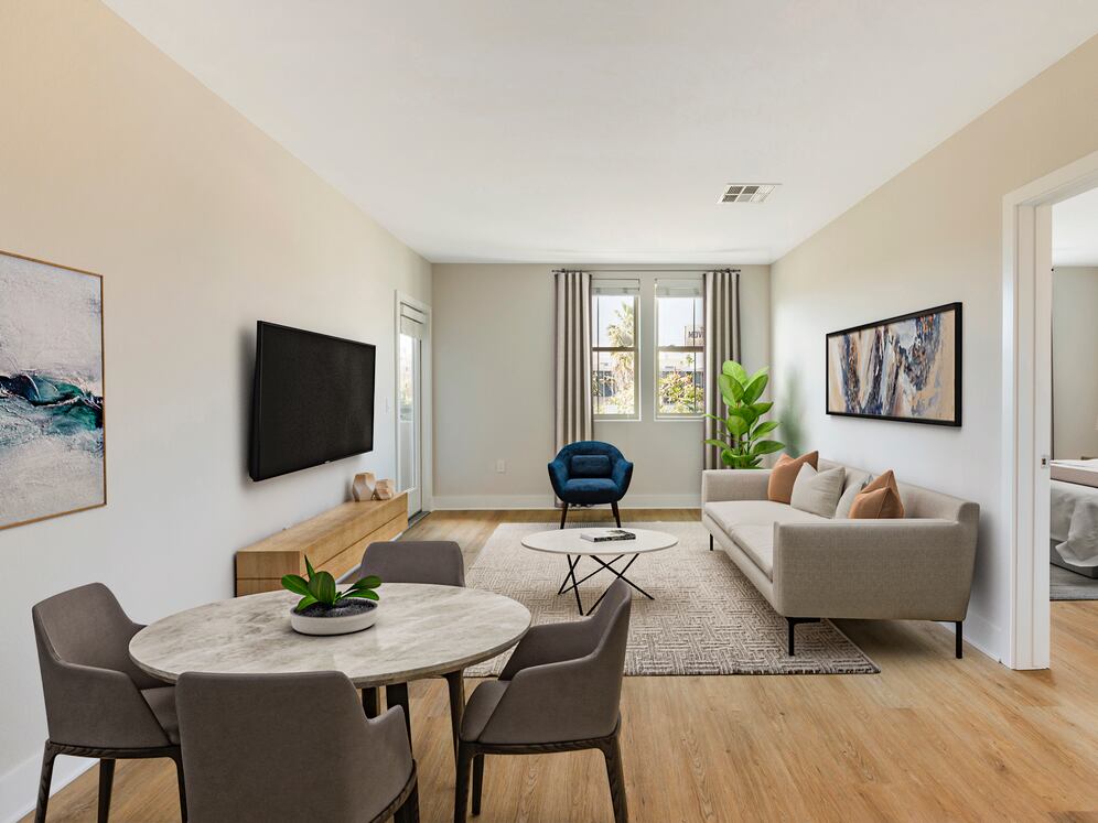 Renovated Package I dining and living room with hard surface flooring