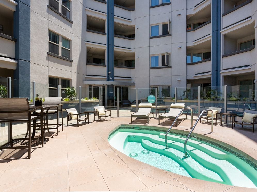 Spa and grill area with cabana and outdoor seating