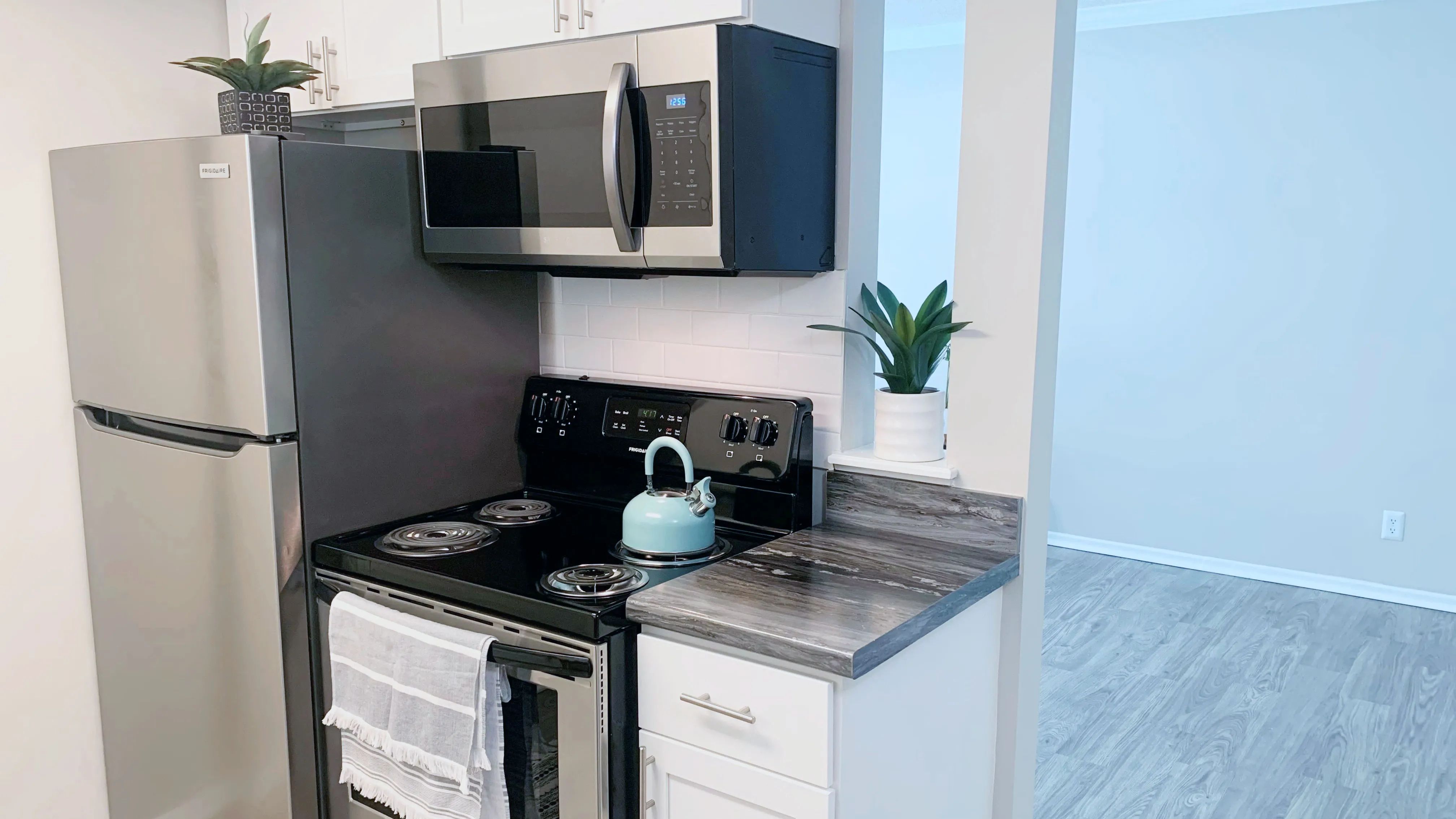  Our chic studio apartments feature a separate kitchen area with modern finishes, combining functionality with style.