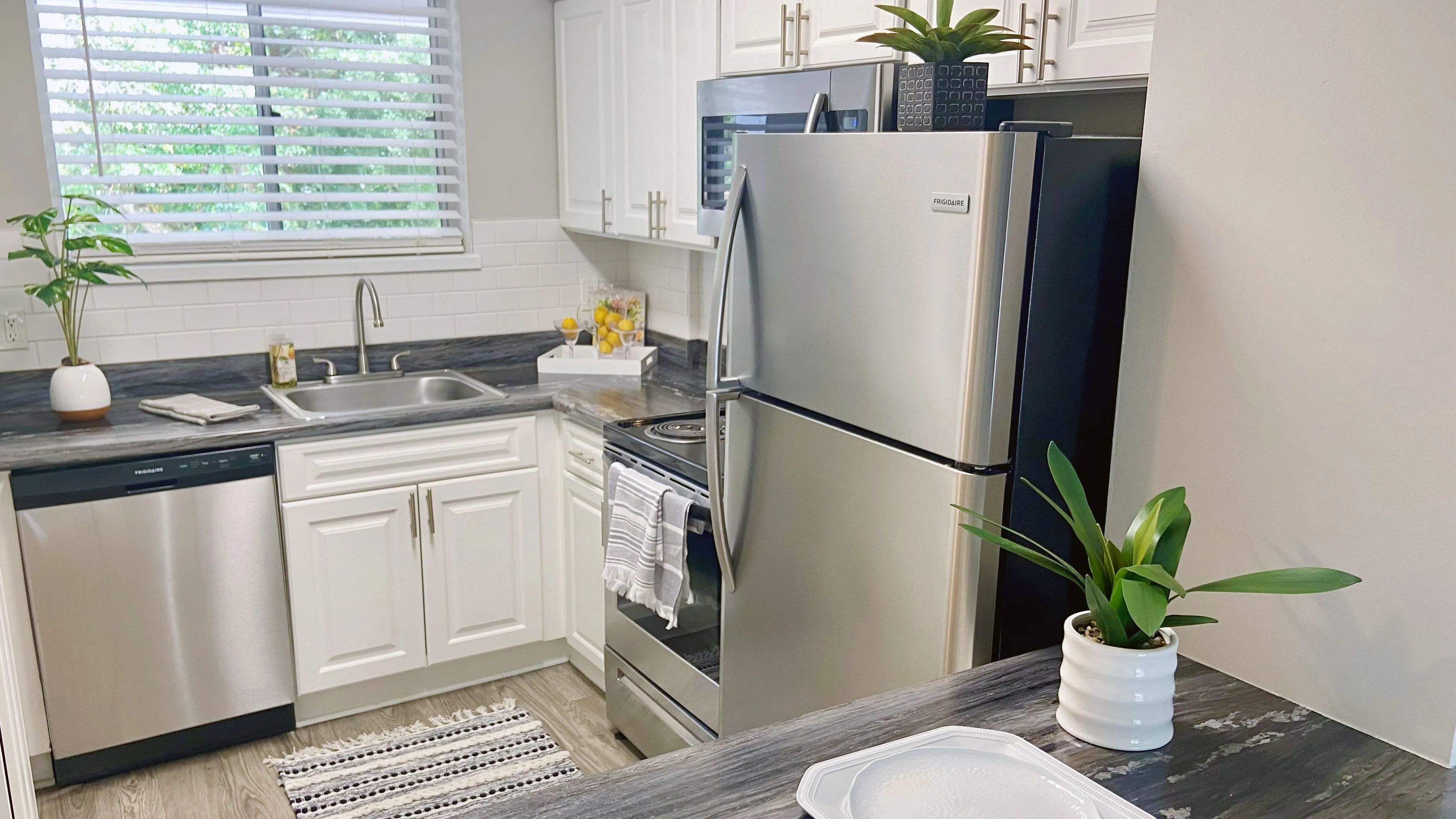 Delight in a cozy breakfast nook overlooking the dining and living area. 