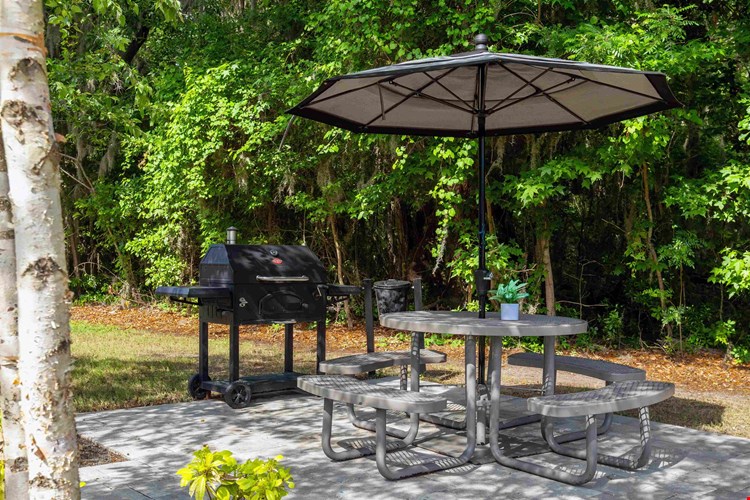 Enjoy al fresco dining at our picnic area, complete with grilling station