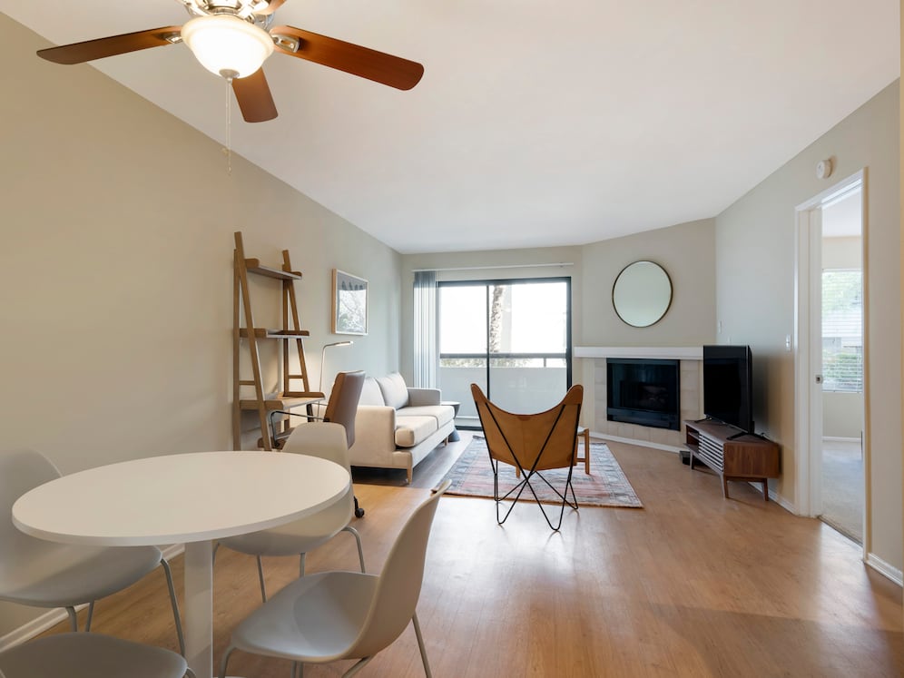 Furnished+ apartment homes include a dining set (Representative Image – exact items and style of furnishings may vary)