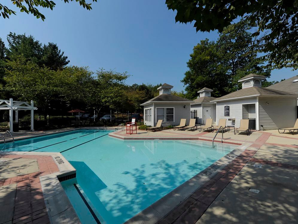 Swimming pool and sundeck with lounge seating