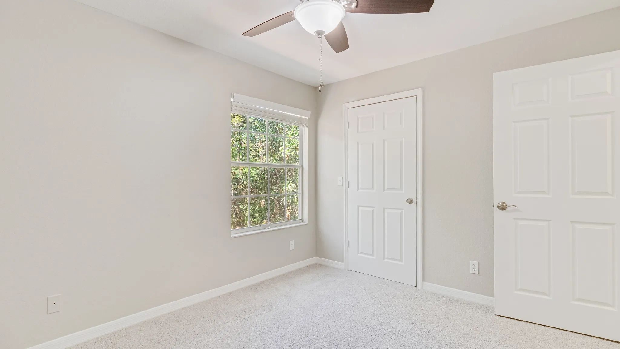 Our bedrooms include large windows for plenty of natural light.