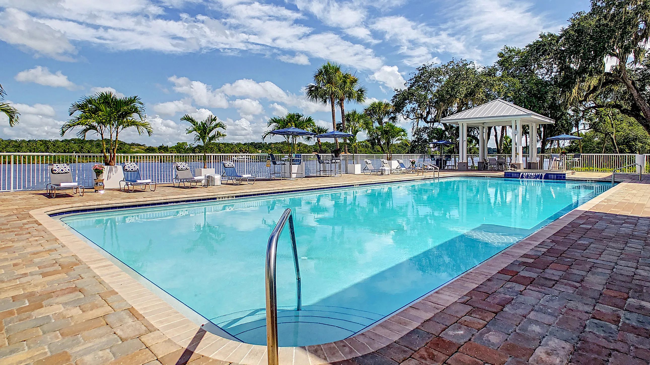 Surrender to leisure amid nature's embrace at our resort-style pool overlooking the serene Alafia River.