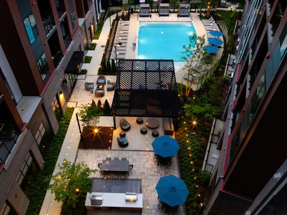 Courtyard #2 with pool, sundeck, BBQ grills, fire pit, and lounge seating