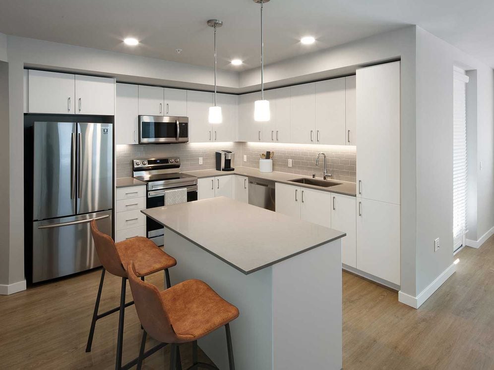 Design Collection I Kitchen, living, and dining areas with hard surface flooring