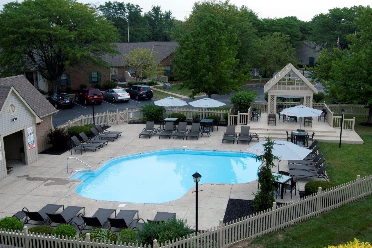 Sparkling Pool with Resort Style Furniture