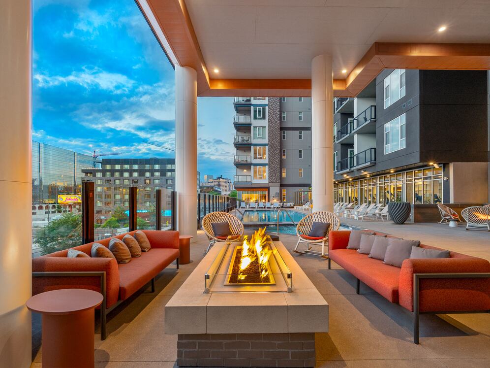Pool with lounge seating and fire pit