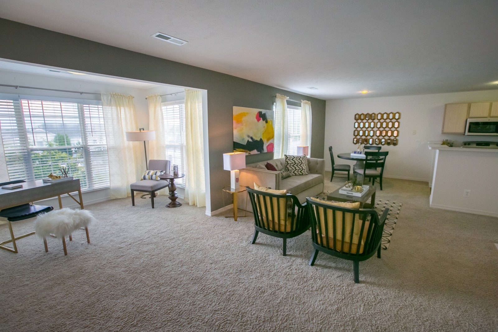Living room and dining spaces at The Residence at Barrington in Aurora, OH
