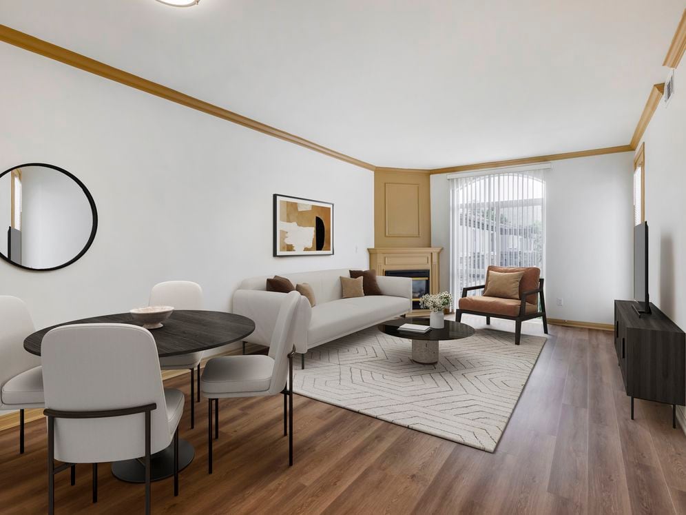 Renovated Package I dining and living room with hard surface flooring