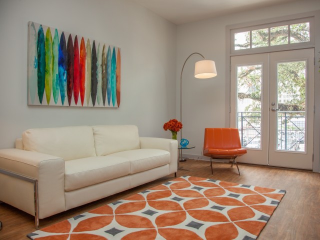Bright Mid-Rise Living Room with Private Balcony