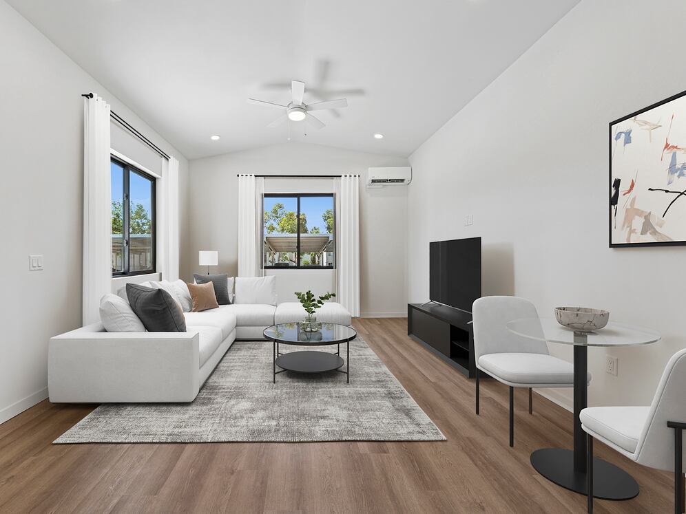 Freestanding Home dining and living room with hard-surface flooring