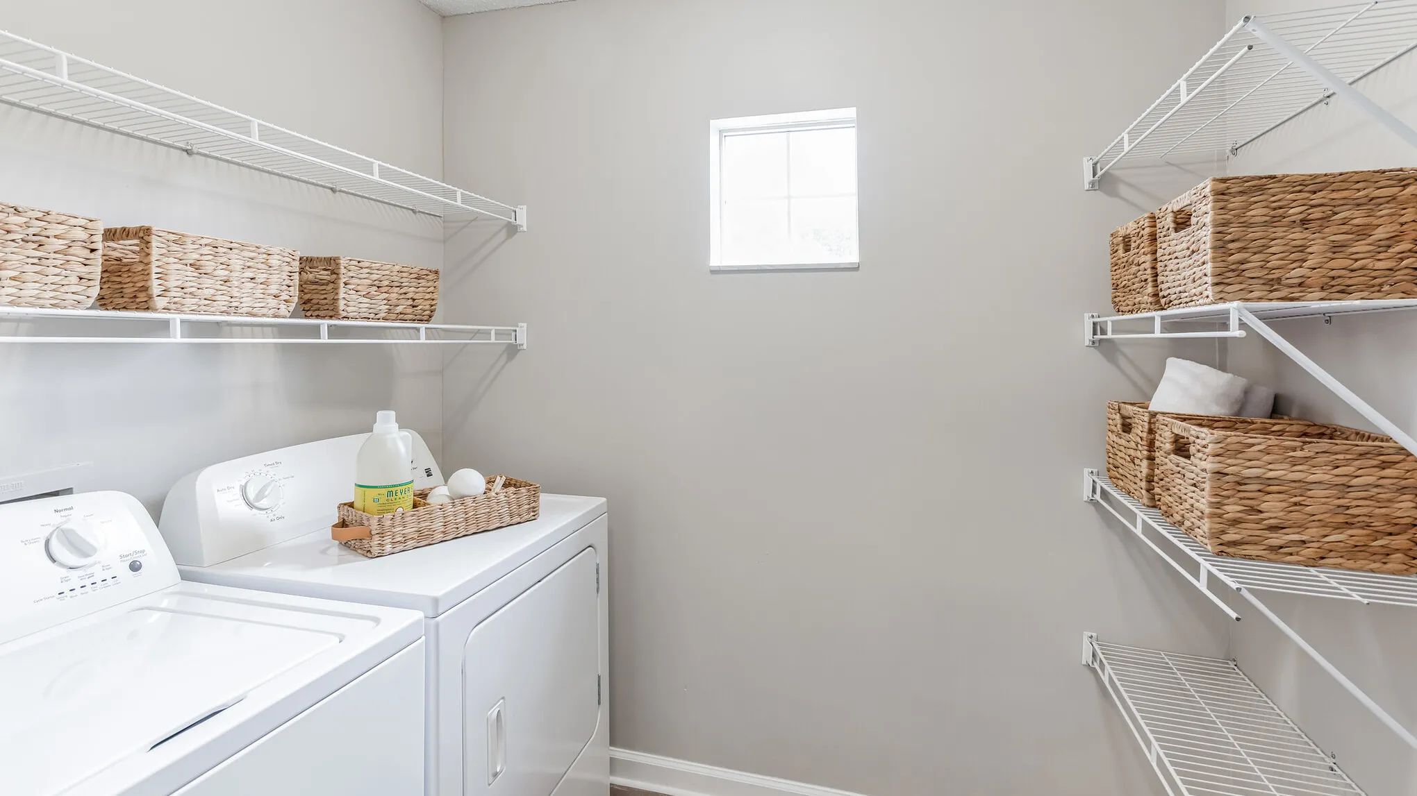 Each apartment boasts a full-size washer and dryer, with spacious laundry rooms and ample additional pantry storage.