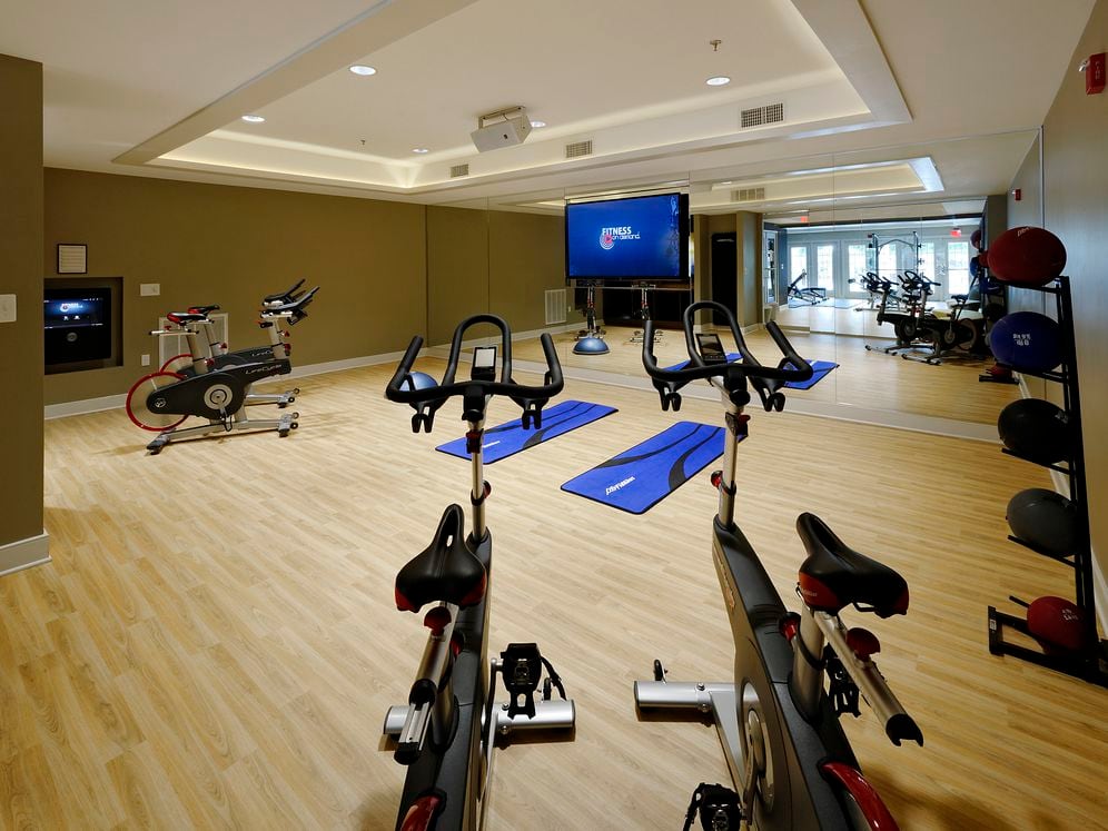 Fitness center with spin bikes and Fitness on Demand programming