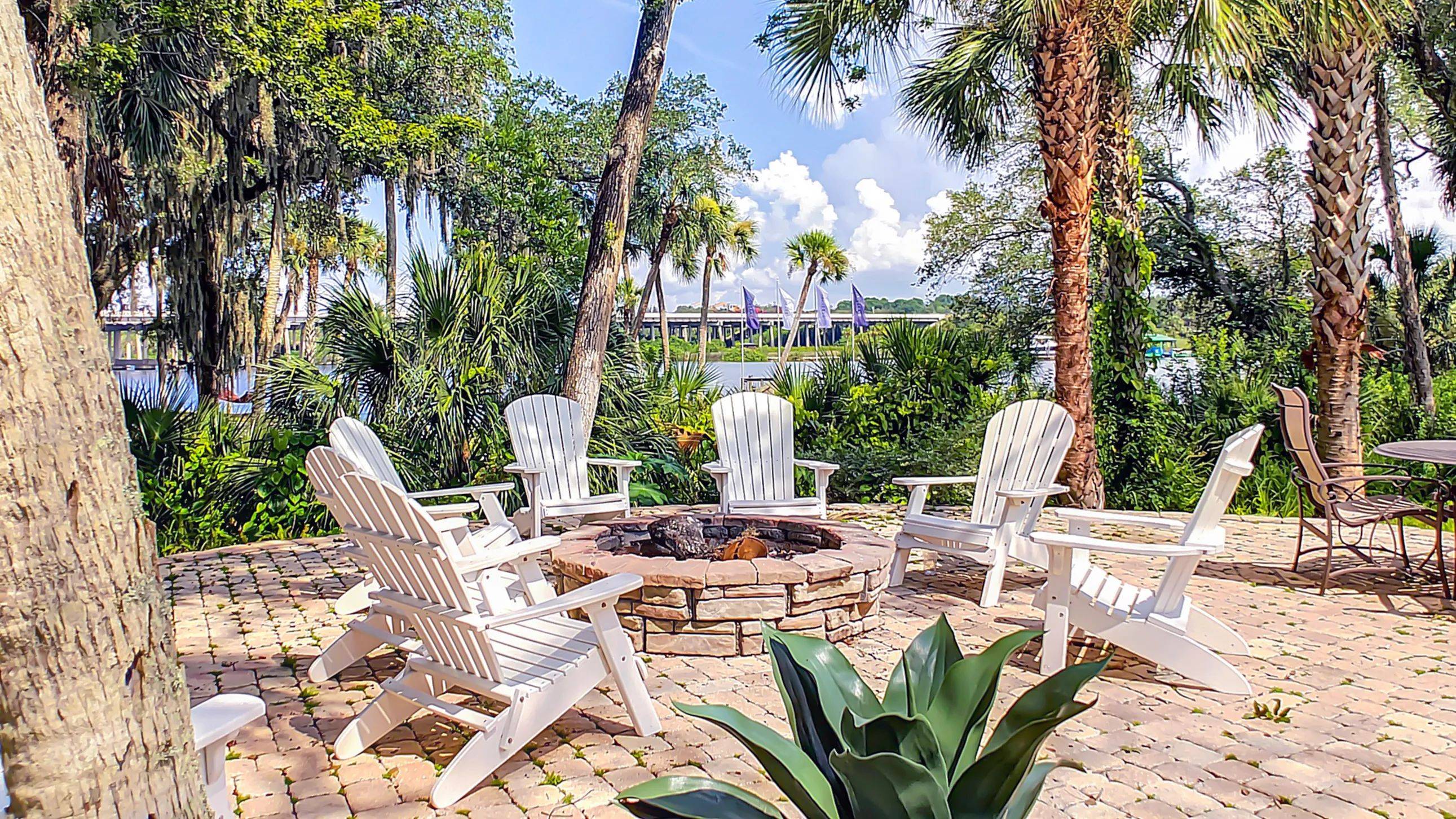 Indulge in serene evenings around a warm fire at our secluded waterfront fire pit.