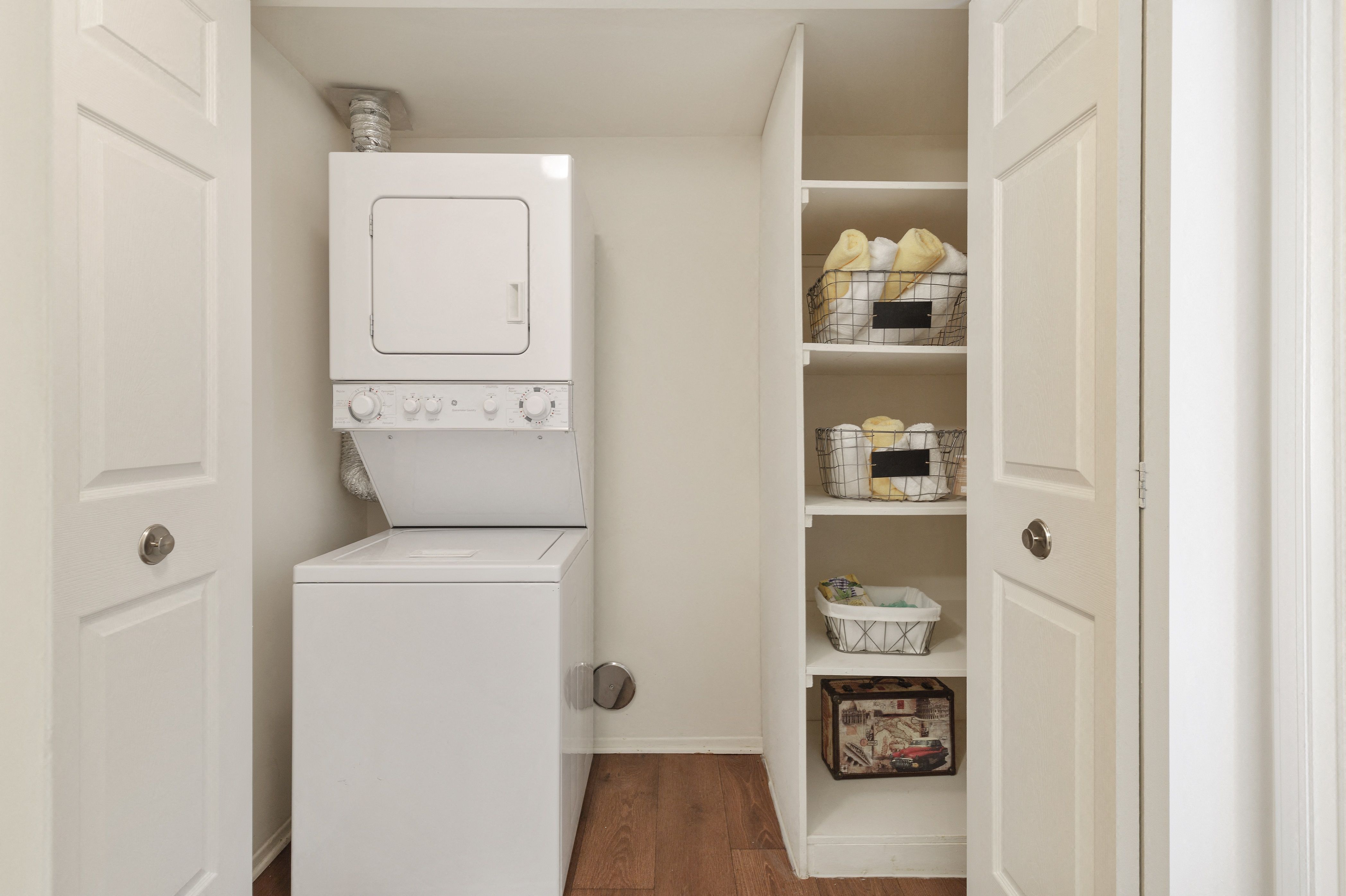 Spacious In-unit Laundry and Linen Closet at Lakeside Village Apartments Clinton Township MI