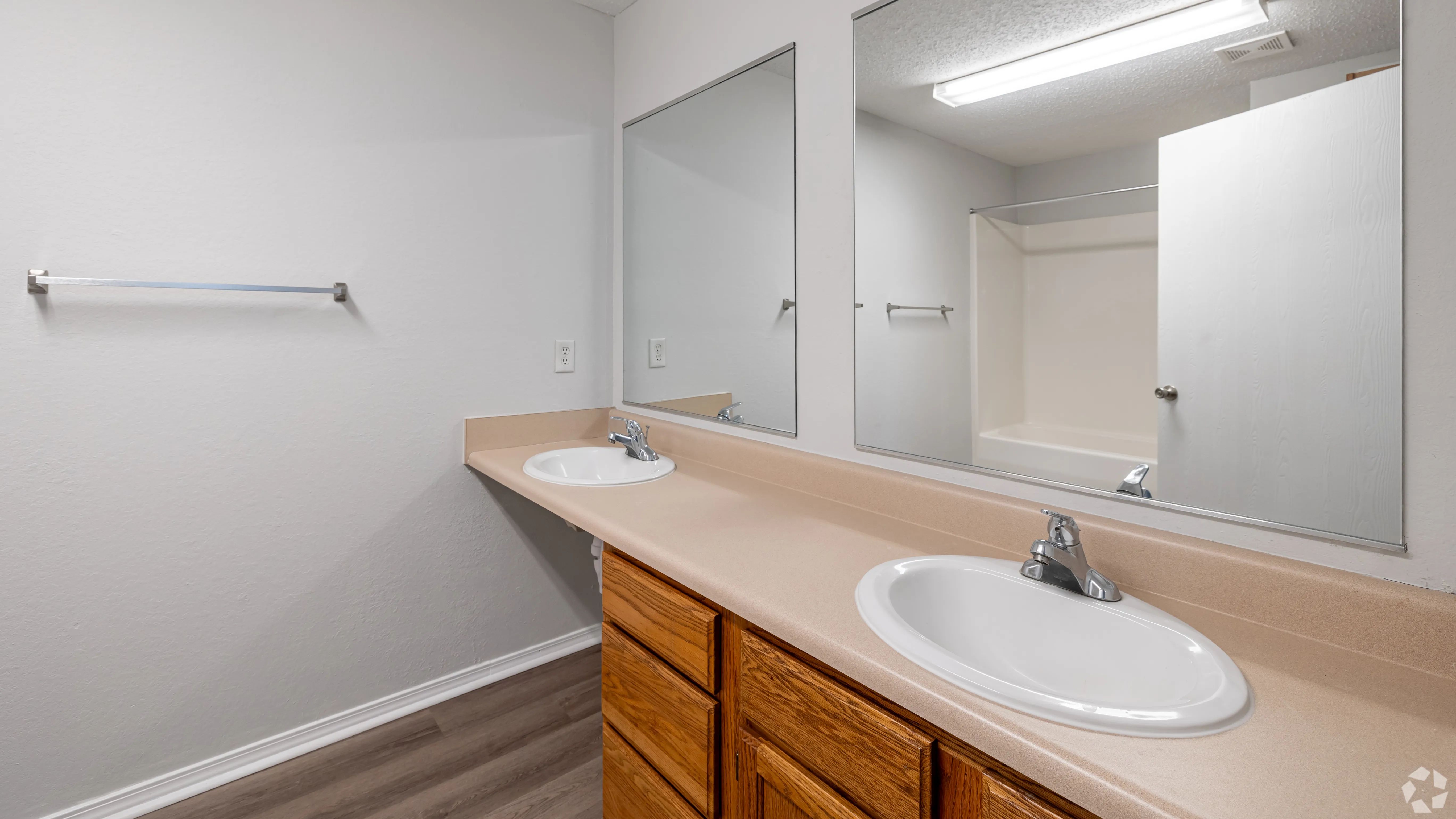 Enjoy the convenience of dual sinks and ample counter space—perfect for busy mornings or shared living at The Avenue.