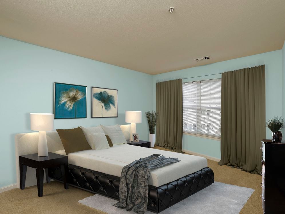 Renovated Package III bedroom with carpeted flooring