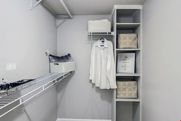 Embrace organized living with our expansive walk-in closet and built-in storage solutions.