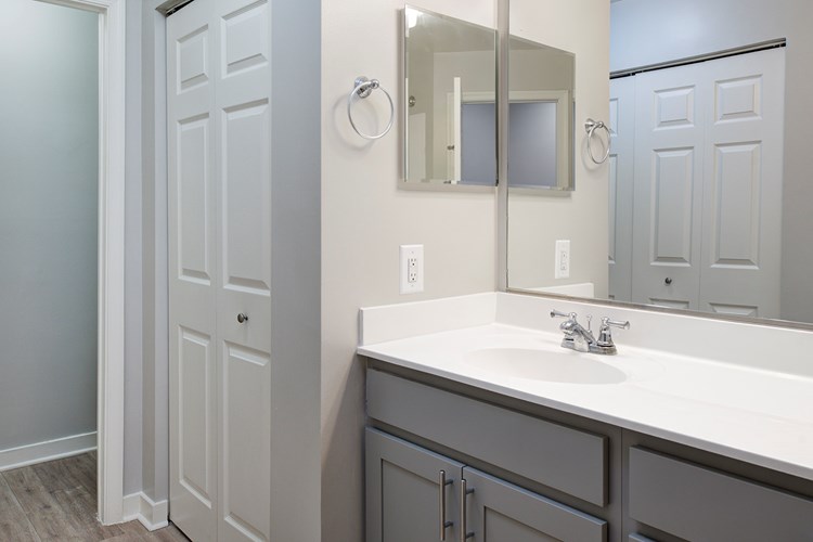 Your bathroom has a large vanity and great lighting to get ready in the morning