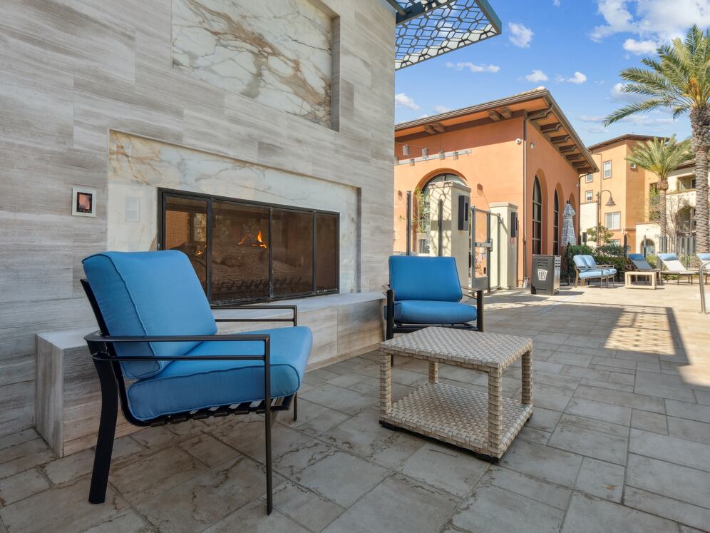 Pool with lounge seating with fire pit
