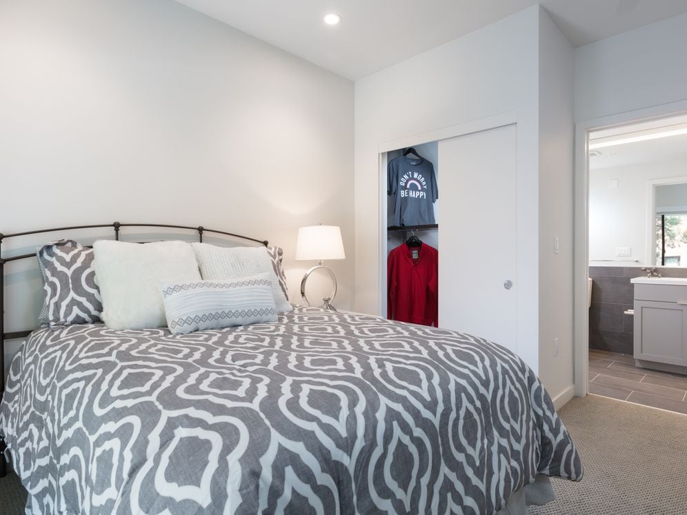 Signature Collection bedroom with hard surface flooring