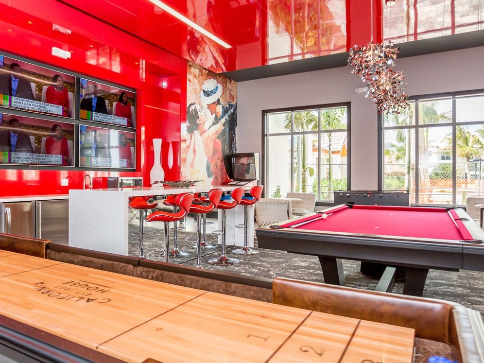 Resident lounge with game area and TV